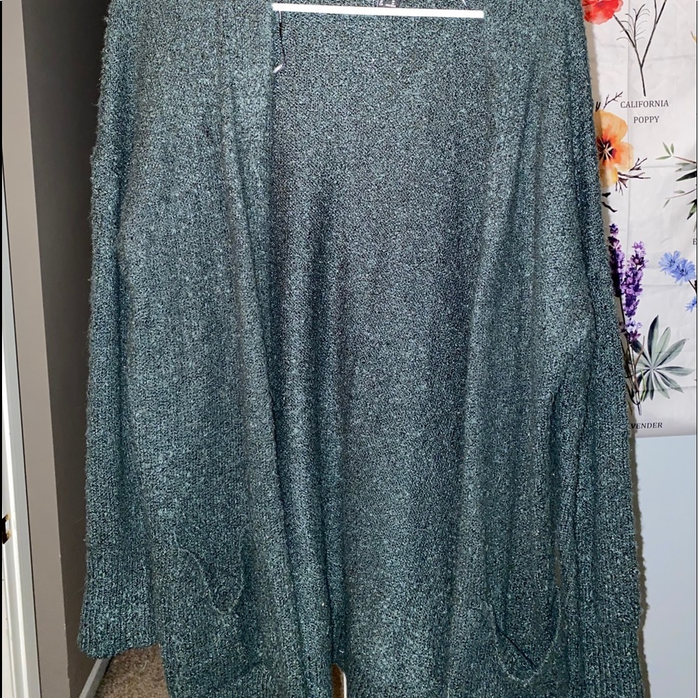 Darker green sweater cardigan with pockets!